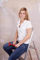 woman sitting on ladder photo