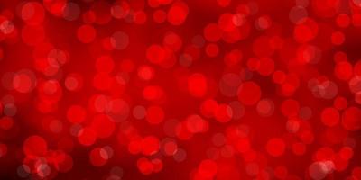 Light Red vector background with circles.