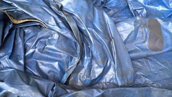 Large Blue Plastic Tarp Background With Wrinkles Shadows,Blue tarps tarpaulin covering video