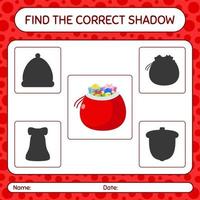 encuentra el juego de sombras correcto con la bolsa de santa. hoja de trabajo para niños en edad preescolar, hoja de actividades para niños vector