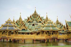 gold and green vintage luxury pavilion was built on the pool, Muang Boran, Thailand. photo