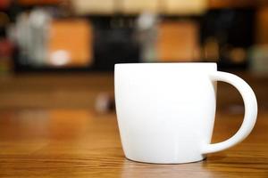 Hot Art Latte in the White art on the wood table photo
