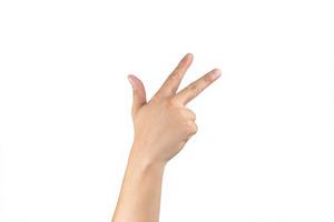 Asian back hand shows and counts 8 eight sign on finger on isolated white background. Clipping path photo