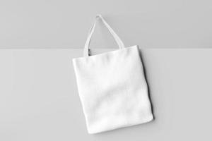 blank white fabric canvas bag for shopping isolated photo