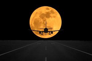 Abstract airplane at super moon photo