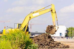 la excavadora esta funcionando foto