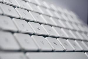 Macro of Wireless White Keyboard. photo