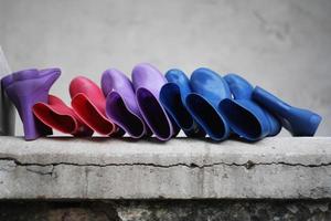 Colorful shoes with a wall background photo