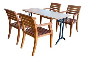 Dining table and wooden chairs. photo