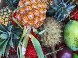 Many fruits stacks wait for a sale. photo