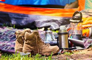 The camping equipment at the front of the tent photo