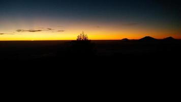 silhouette background in Prau Dieng, Central Java photo