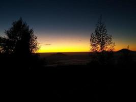 silhouette background in Prau Dieng, Central Java photo