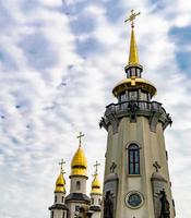 Christian church cross in high steeple tower for prayer photo