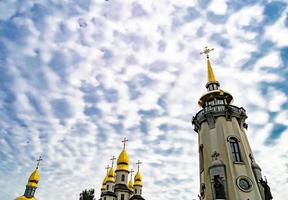 Christian church cross in high steeple tower for prayer photo