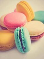 Colorful pastel macarons in vintage style. Sweet macarons with pastel colors. photo