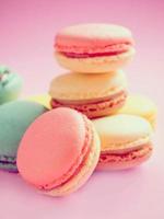 Colorful pastel macarons in vintage style. Sweet macarons with pastel colors. photo