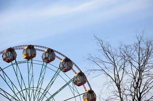 part of the Ferris wheel against the blue sky. Attraction. geometric background photo