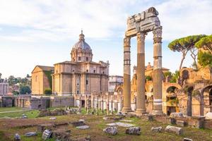 Sunrise light with blue sky on Roman ancient architecture in Rome, Italy photo