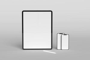 Tablet screen with smartphone blank mockups photo