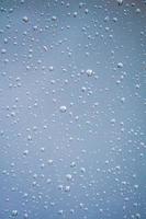 raindrops on the window in rainy days, abstract background photo