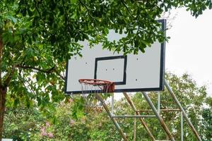 Basketball backboard in the park. It is public. photo