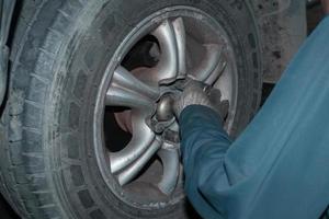 The mechanic is checking the engine. photo