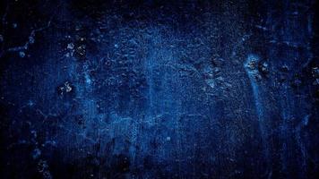 dark blue grungy abstract cement concrete wall texture background photo