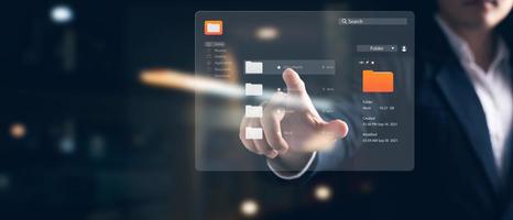 virtual screen icon Document Management System DMS, business developer hands-on touch screen virtual system for organizing online document databases, searching managing files and data efficiently. photo