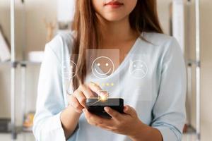 User give rating to service experience on online application, Customer review satisfaction feedback survey concept, Customer can evaluate quality of service leading to reputation ranking of business. photo