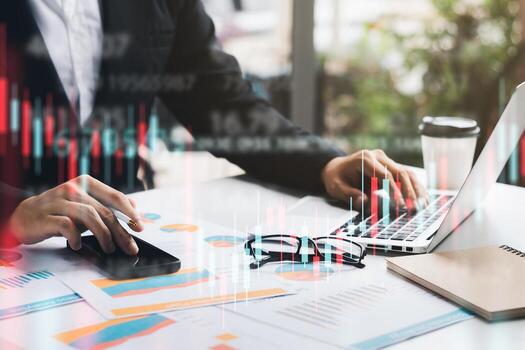 Businessman working in office, technical price chart and red and green candlestick chart indicator and computer screen background for stock trading, double exposure Traders analyze data. photo