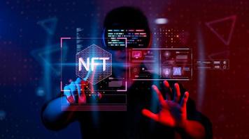 businessman finger touch virtual screen, NFT token digital crypto art blockchain technology concept. photo