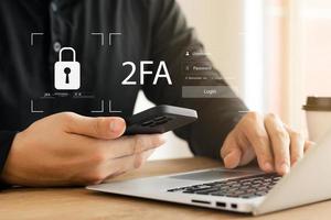 Two-factor authentication 2FA via smartphone, two-factor authentication security, account lock account protection, privacy protection, personal data encryption, cyber online privacy. photo