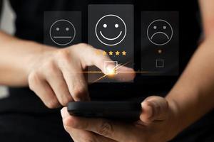 User give rating to service experience on online application, Customer review satisfaction feedback survey concept, Customer can evaluate quality of service leading to reputation ranking of business. photo