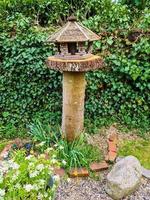 Beautiful bird house in a tree in northern Europe on a sunny day. photo