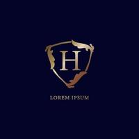 Letter H Alphabetic logo design template. Luxury metalic gold security logo concept.  isolated on navy blue backgroud. Decorative floral shield sign illustration vector