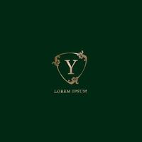 Letter Y Alphabetic logo design template. Insurance logo concept isolated on dark green background. Luxury gold decorative floral shield sign illustration. vector