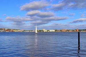 At the port of Kiel with some boats and ships photo