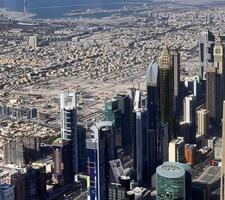 Aerial view over the city center of dubai on a sunny day photo