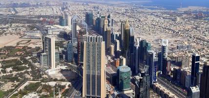 Aerial view over the city center of dubai on a sunny day photo