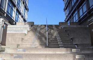 Modern office building facades with glass and reflecting sunlight in the windows photo