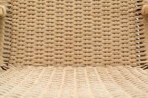 Closeup of wood chair with rattan, Beautiful oak wood texture surface , rattan pattern. photo