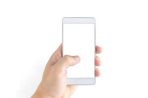 Left hand of a white man holding a white mobile phone and a white screen at a isolate background with clipping path. photo