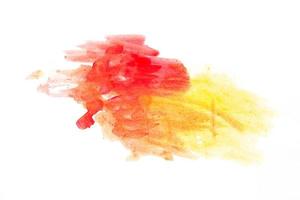 Abstract watercolor yellow and red draw using a brush on white paper, watercolor background. photo