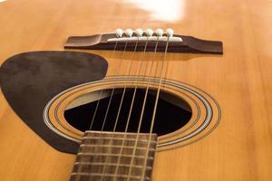 detail of classic guitar with shallow depth field photo