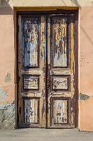 Old wooden brown house door photo