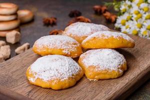 Homemade corn cookies on concrete table - healthy homemade vegan vegetarian pastry photo