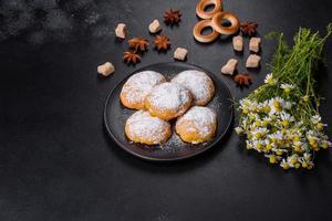 Homemade corn cookies on concrete table - healthy homemade vegan vegetarian pastry photo