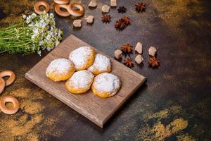 Homemade corn cookies on concrete table - healthy homemade vegan vegetarian pastry photo