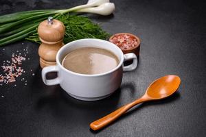 A delicious fresh, thick soup of mushroom puree with breadcrumbs, spices and herbs photo